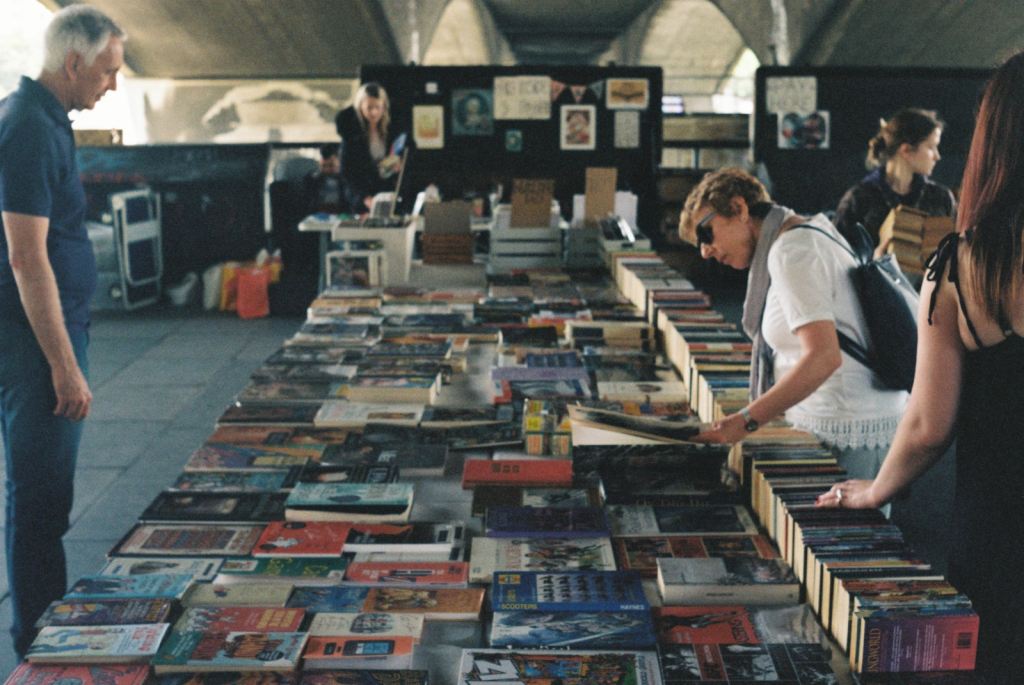 assorted books on table markets in london