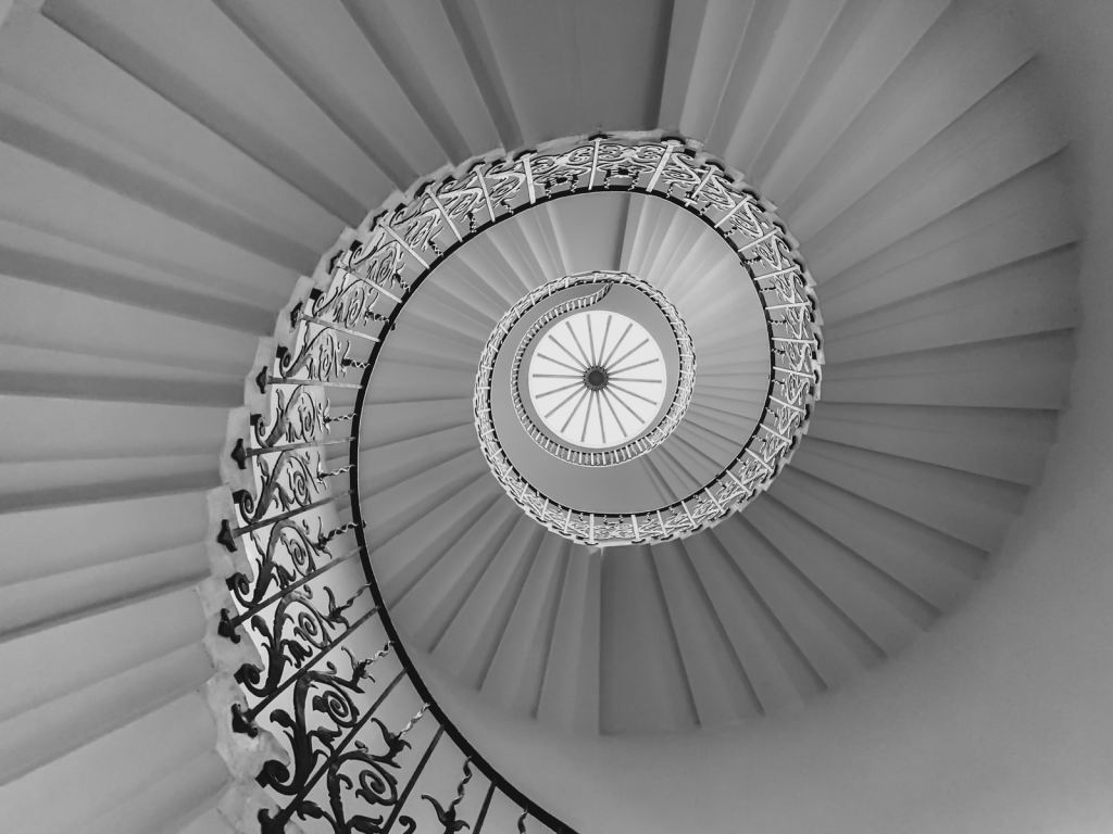 white spiral staircase with white metal railings free museums